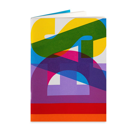 A colourful letterpress notebook that reads 'IDEAS' in vibrant shades of Red, purple, blue, pink, yellow and green.