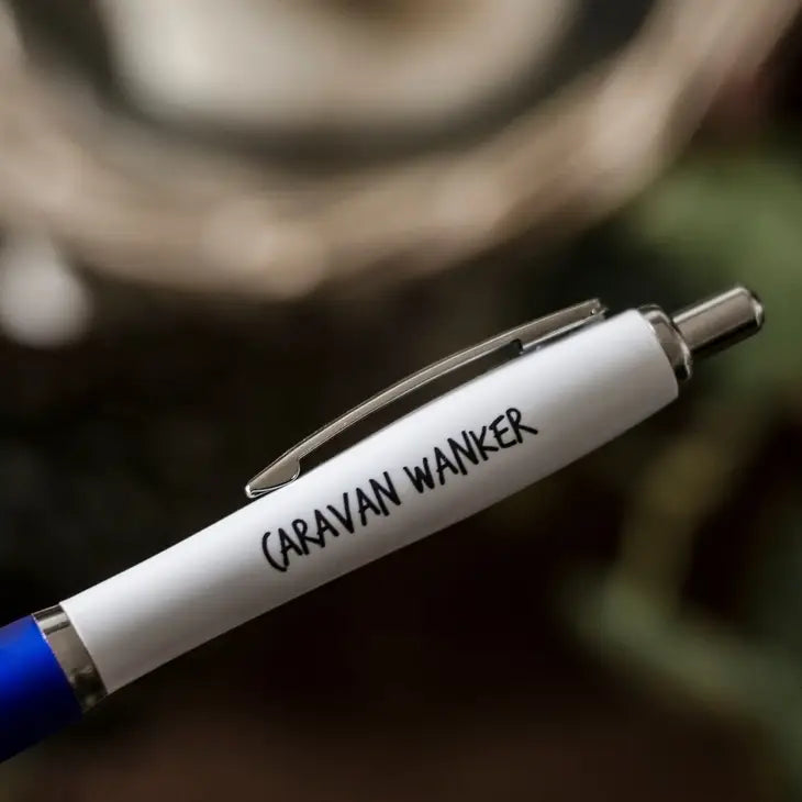 A white and blue with text on on that reads: Caravan Wanker