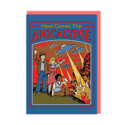 A greeting card with an illustration of children in the foreground and an apocalypse scene with UFO's in the background. The text on the card reads 'Here Comes The APOCALYPSE'.