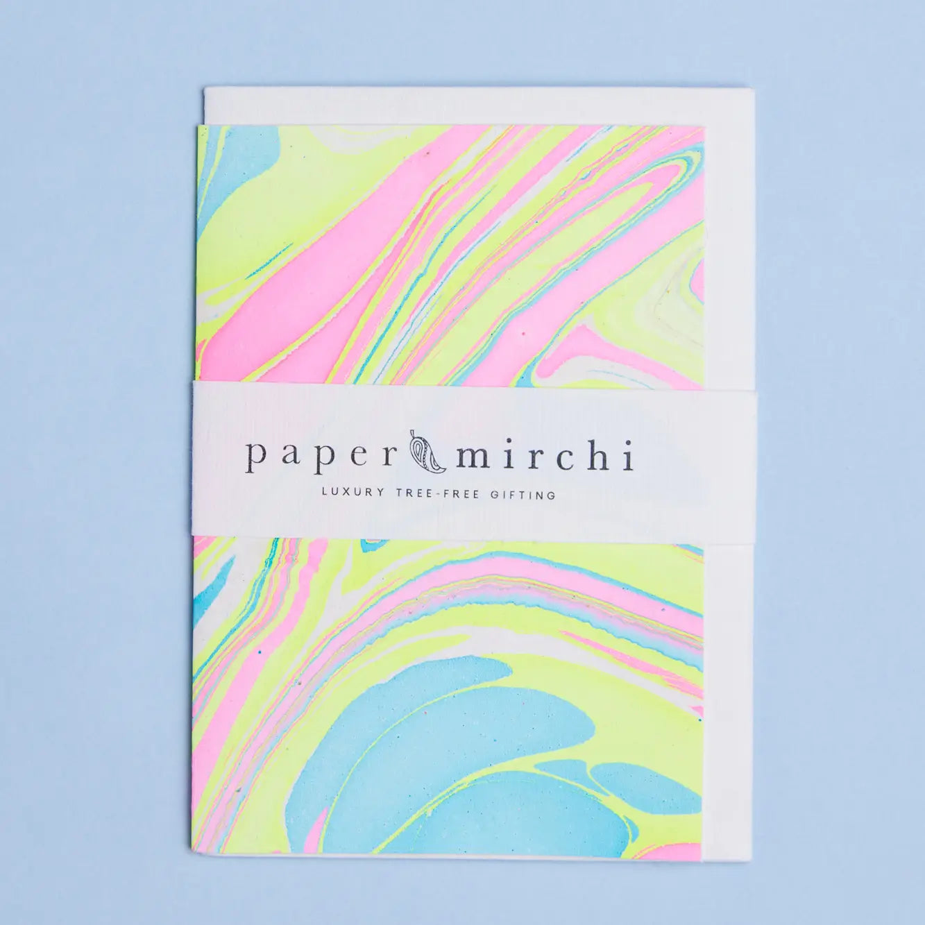 A colorful hand marbled greeting card with neon patterns, branded with 'paper mirchi'.