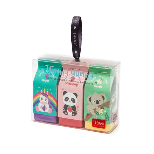 3 scented rubbers that are shaped like milk cartons. A purple unicorn, a pink panda and a yellow with a koala