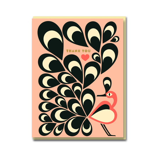A pink card with a pink bird stood at the bottom right corner. The bird has lots of black and white feathers coming off the back end of it and there is text on the card that reads 'Thank You'