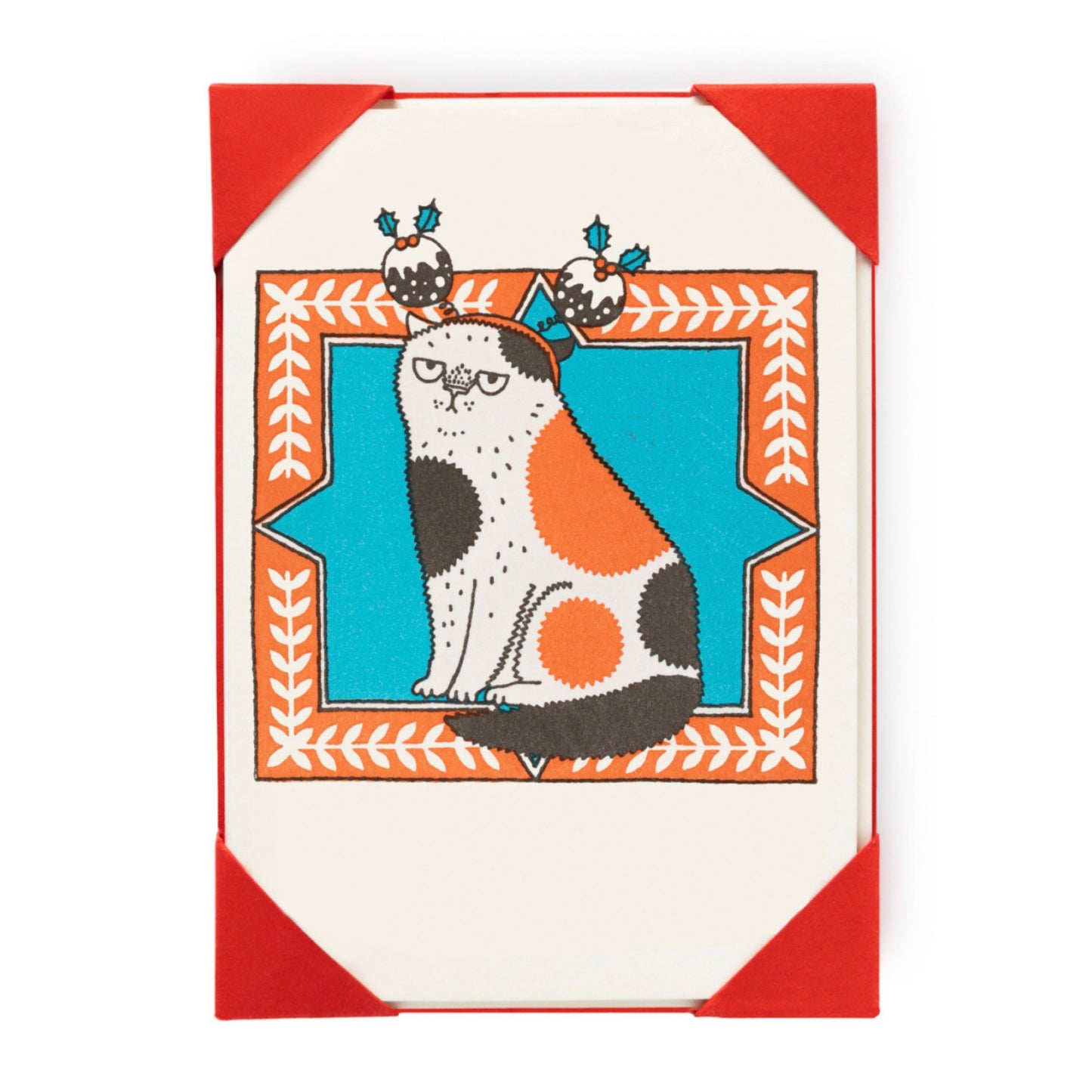 Archivist letterpress card with a grumpy orange, black and white cat on the front wearing a Christmas pudding headband.