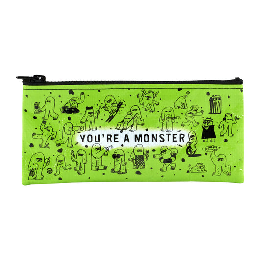 A green pencil case with drawings of monsters all over. The text on the pencil case reads: You're a monster.