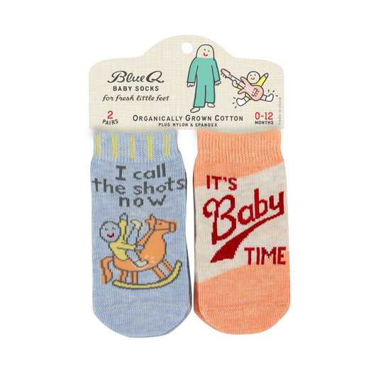 2 pairs of baby socks with text on that reads: 'I call the shots now' and 'Hello I'm new here'