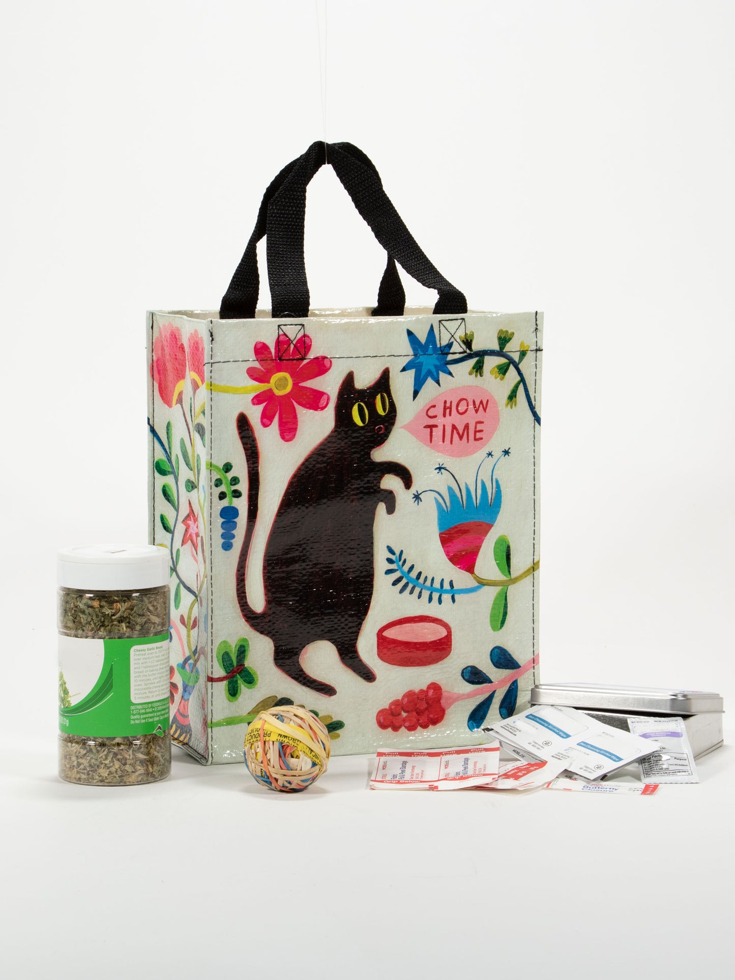 A white Blue Q lunch bag with a drawing of a black cat with pink blue yellow and green around. The text reads: Chow time