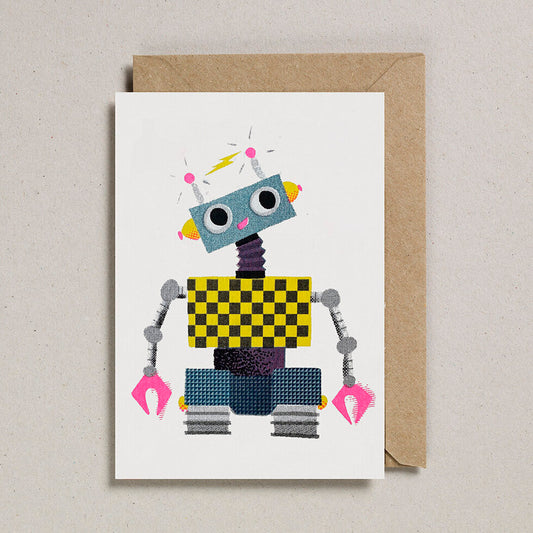 A white card with a print of a yellow grey and pink robot on the front.