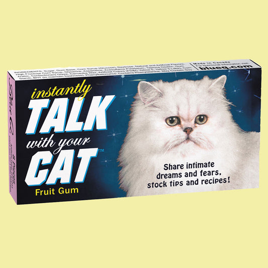 Blue Q gum with a white fluffy cat on the front. The text on the box reads: Instantly talk with your cat fruit gum.