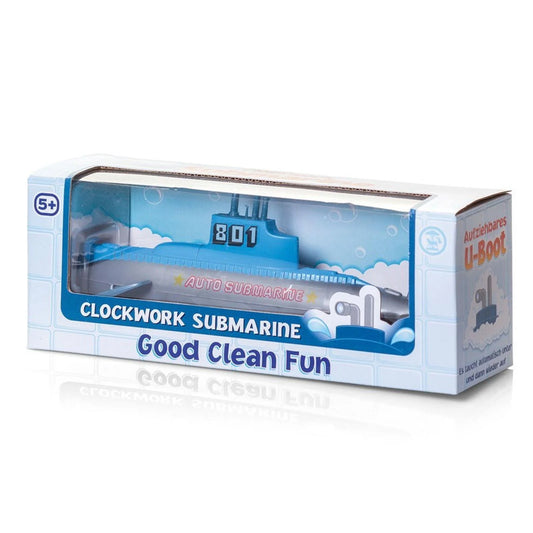 A blue box with a clear front so you can see the blue and grey submarine toy inside. The text on the box reads: clockwork submarine good clean fun 5+