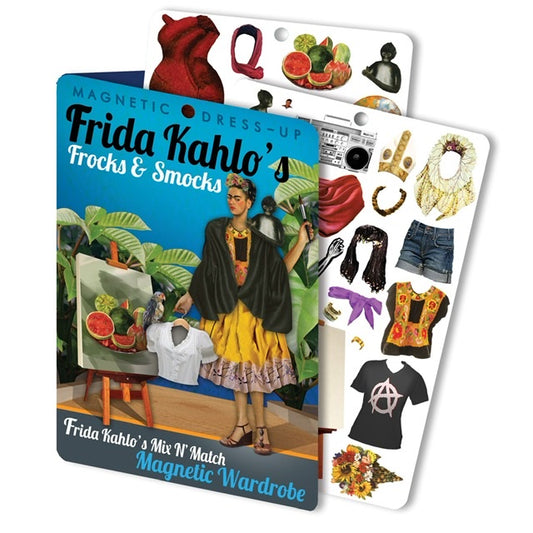 A blue magnetic dress up set with Frida Kahlo on the front. In the background there are 2 sheets of magnets to dress her up with including a head dress, a wig, a blow of fruit, a stereo, a necklace and an anarchy symbol t-shirt