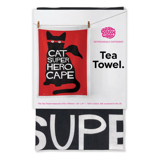 A red tea towel with a black cat on the front wearing a red super hero mask. There is text on the tea towel that reads: ' Cat super hero cape' 