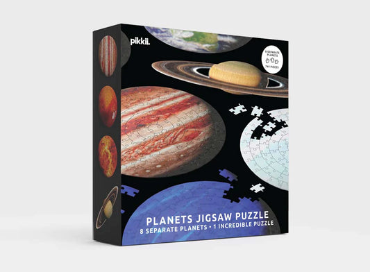 Black box with images of planet jigsaw puzzles on the front. The box reads: Planet jigsaw puzzle, 8 separate planets 1 incredible puzzle 