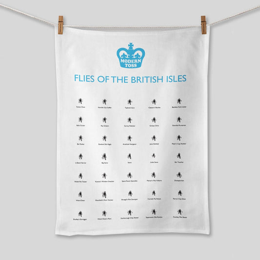 A white tea towel hung on a washing line that has lots of flies with different funny flies names on. The text on the tea towel treads: 'Flies of the british isles'