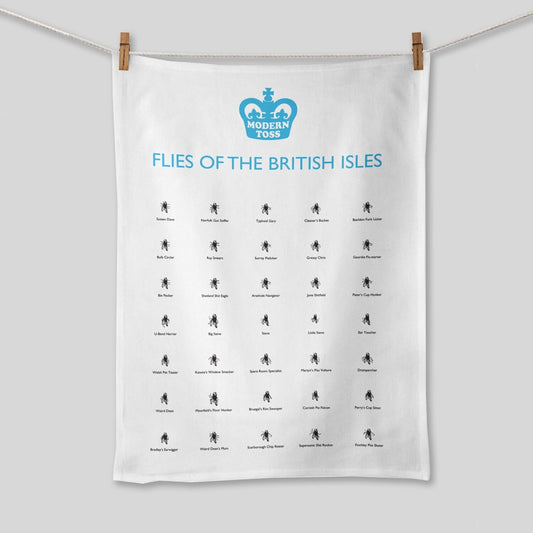 A white tea towel hung on a washing line that has lots of flies with different funny flies names on. The text on the tea towel treads: 'Flies of the british isles'  