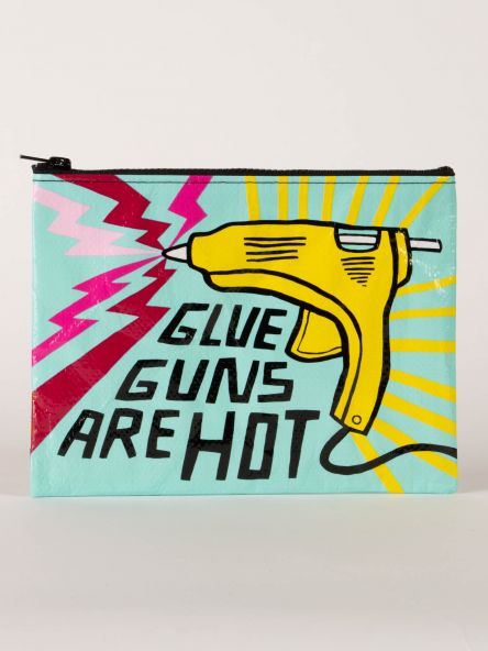 A light blue zipper pouch with a yellow glue gun and purple and pink zig zags. The text reads: ' Glue guns are hot'