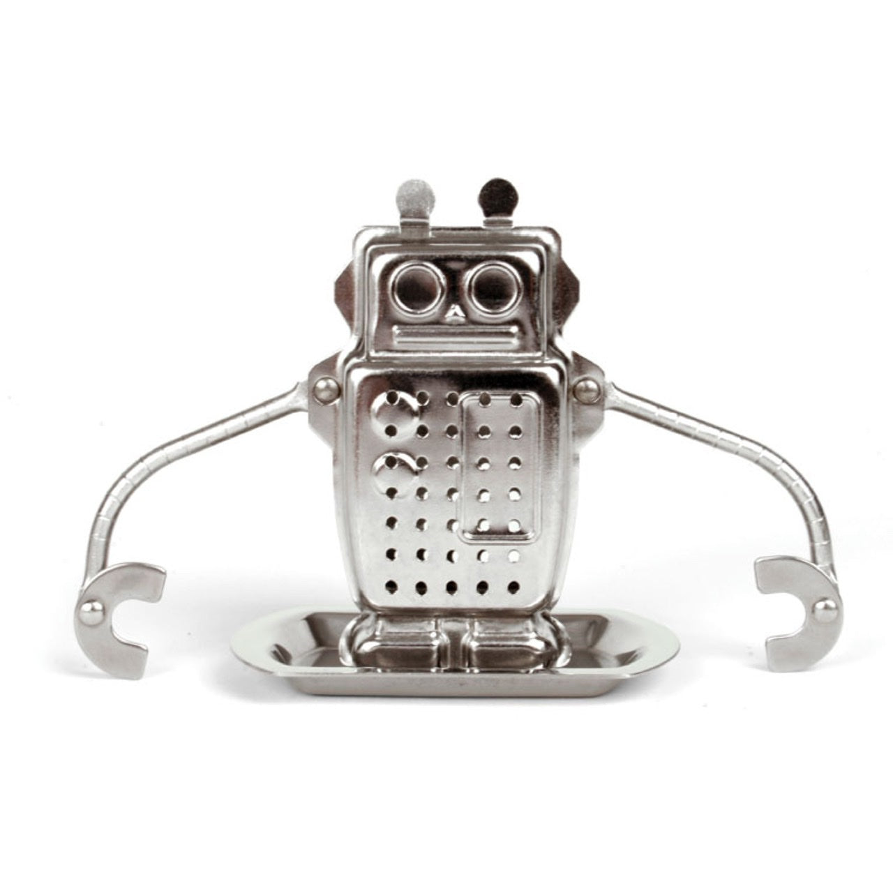 A silver metal robot stood on a little tray. the robots arms are long so they can hang onto each side of the cup and body opens up with 2 little clips at the top to put your tea in.