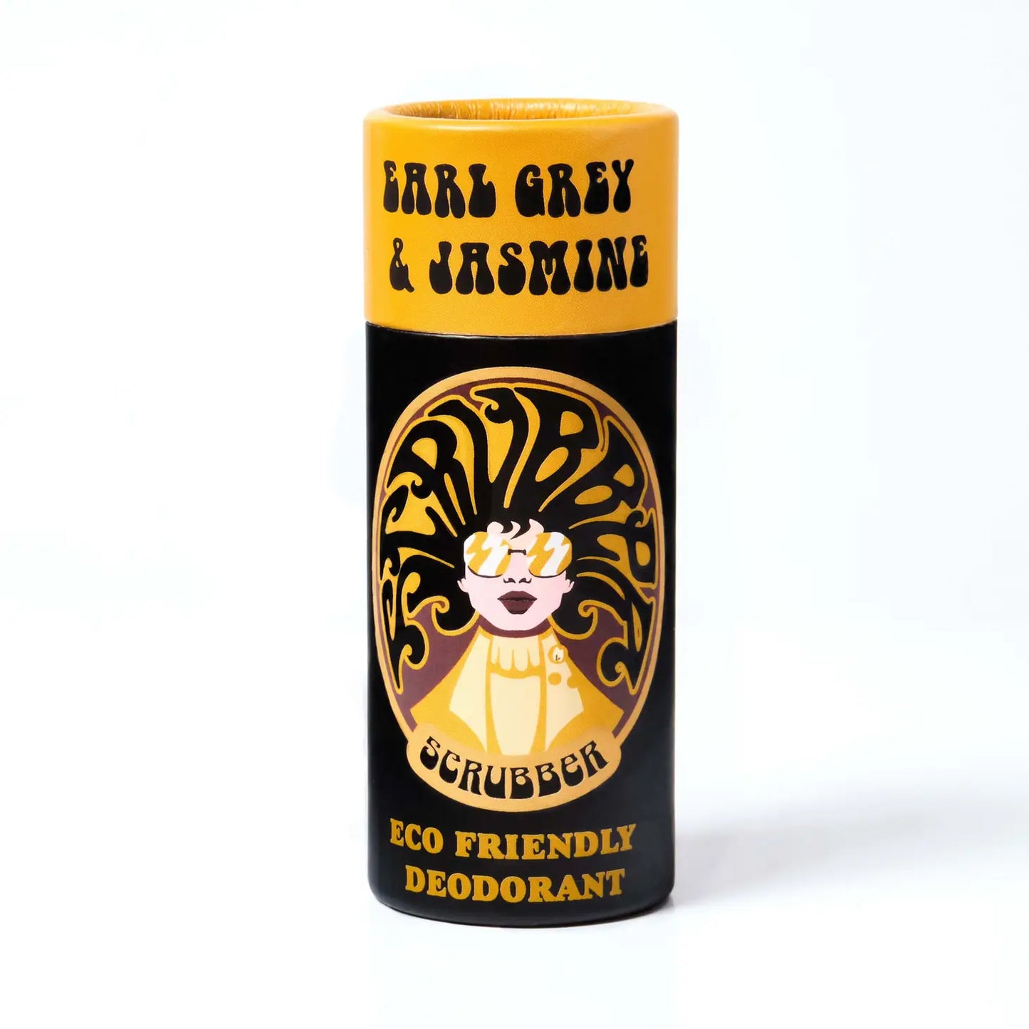 A black and yellow cardboard tube containing eco friendly deodorant. in the middle is an image of a woman wearing sunglasses and her hair forms the word 'scrubber' The text on the tube reads: 'Earl grey & jasmine - scrubber - eco friendly deodorant'