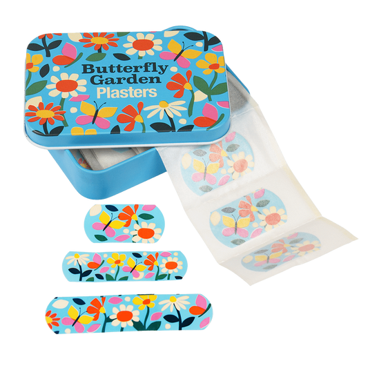 An open tin with butterfly plasters coming out of it. On The front of the tin there is a picture of butterfly's and flowers and infront of it there are 3 different sized butterfly plasters