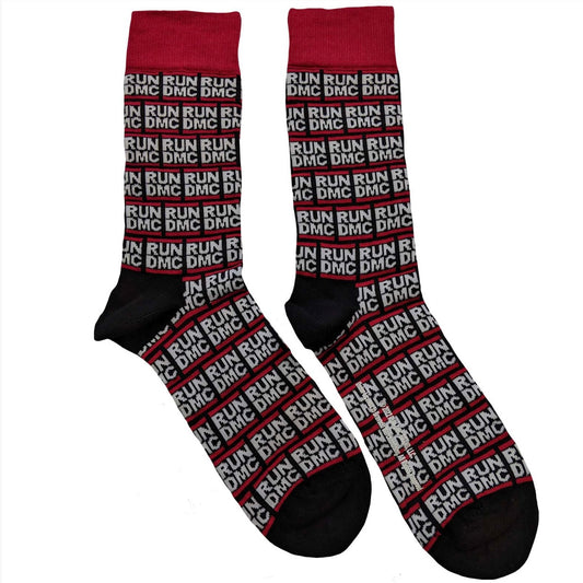 A pair of place and socks with red bands at the top. The socks feature red and white 'RUN DMC' Logos all over. 