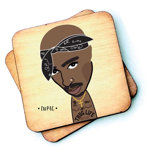 Image shows a wooden drinks coaster with a cartoon graphic of Tupac on the front