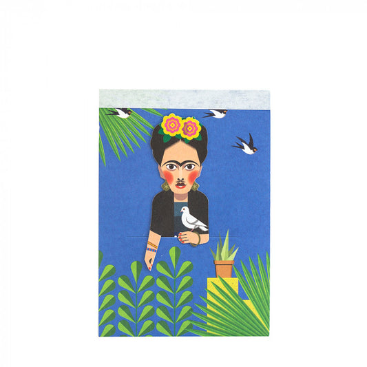 Image shows paper sketch pad with graphic of artist Frida Kahlo and removable paper bookmark tucked into a slit on the front cover