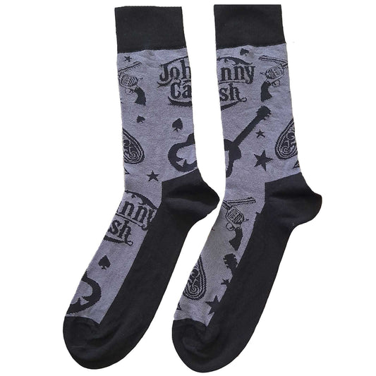 A pair of black and grey socks with 'Johnny Cash' written on them. They also feature pictures of guns and guitars in the same colour scheme.