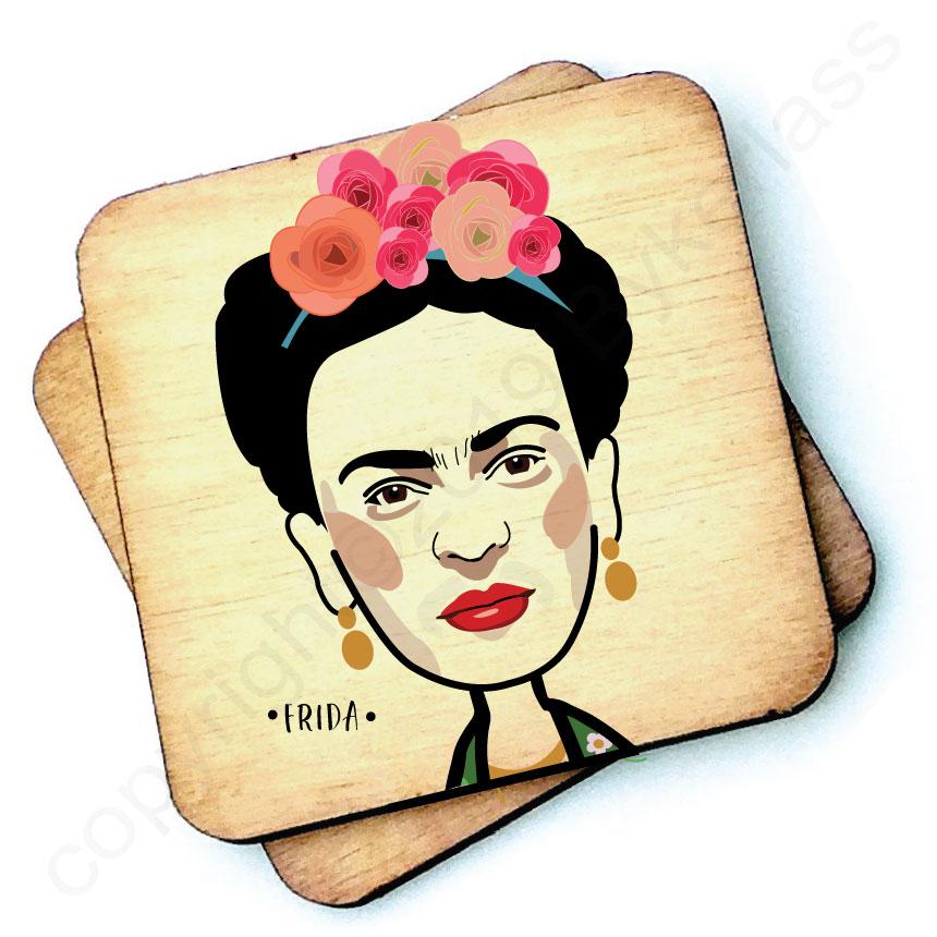 Image shows a wooden drinks coaster with a cartoon graphic of Frida Kahlo  on the front