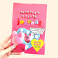 Pink 'Personal Growth Journal' with colorful text and a cartoon character on a light pink background.