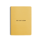 A yellow notebook with the text 'GET SHIT DONE' printed on the cover.