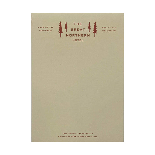 A light green note pad with 'The great northern hotel' Written on the front
