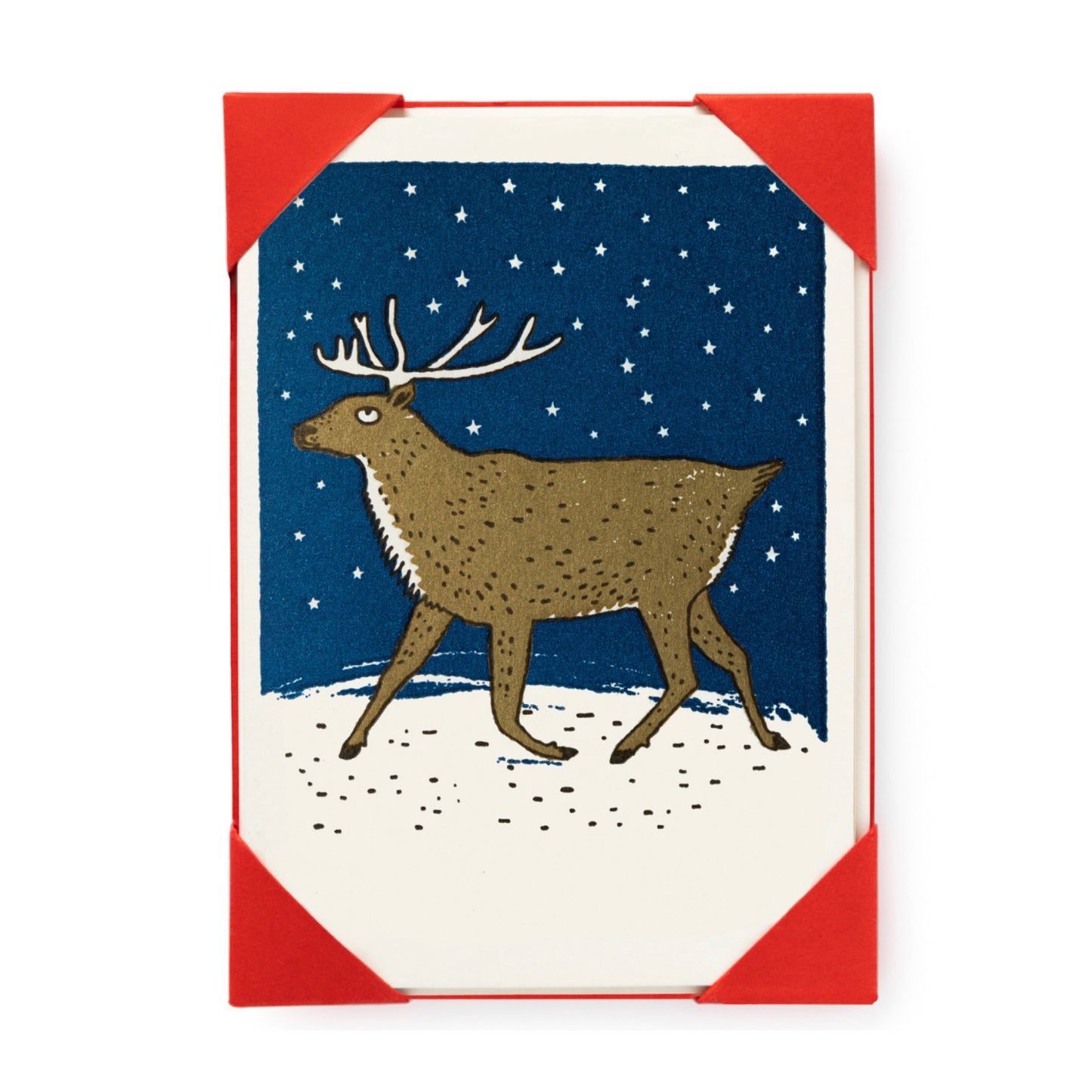 Archivist letterpress card with a Reindeer on the front walking on snow with stars above him.