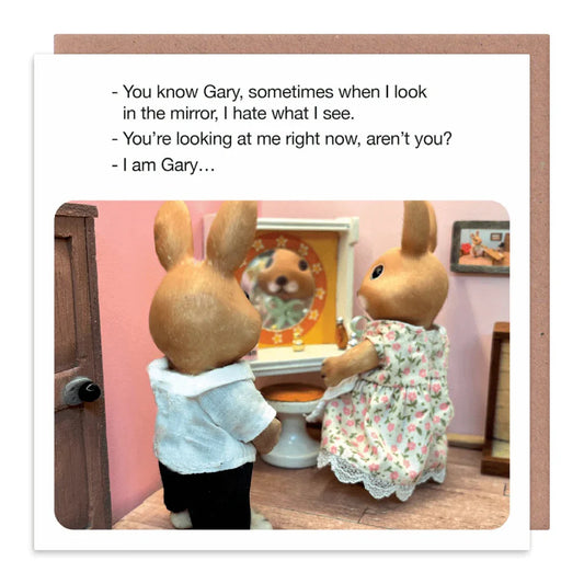 Two toy rabbits looking at themselves in a mirror with humorous text.