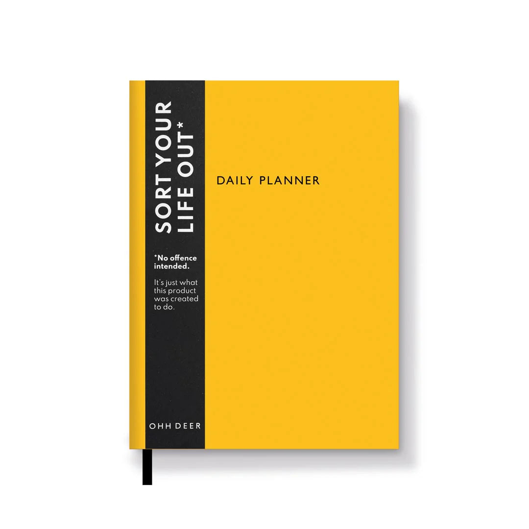 A yellow daily planner. There is a removable band round that reads: “SORT YOUR LIFE OUT”