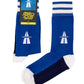  A pair of blue socks with white stripes and a Highway logo in the centre. They are on a yellow and black packaging with the words “Stereo Socks”.