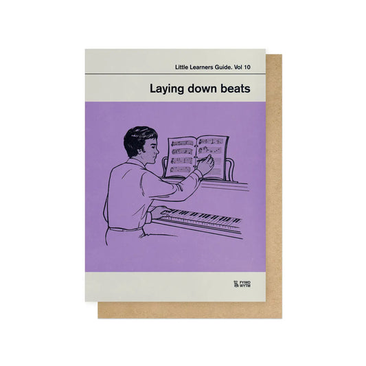 Card titled 'Laying down beats' with a illustration of a person at a piano on a purple background.