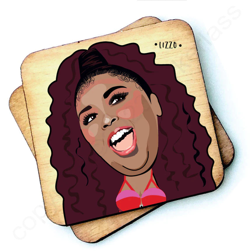 Image shows a wooden drinks coaster with a cartoon graphic of Lizzo on the front