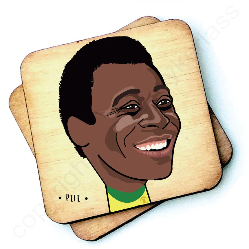 Image shows a wooden drinks coaster with a cartoon graphic of Pele on the front