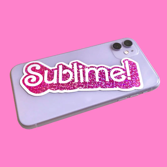 Sticker that reads  'Sublime!' with a pink sparkly background