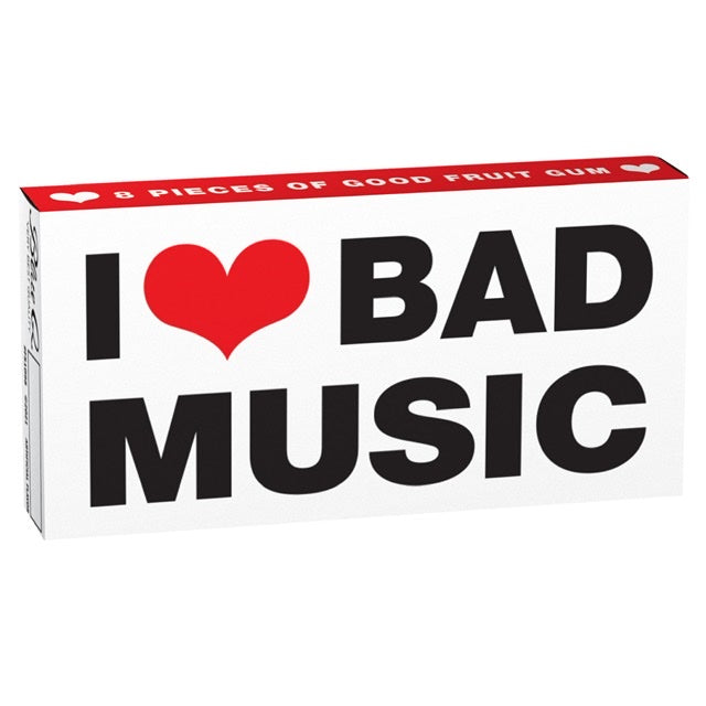 White and red box of Blue Q that reads: I love bad music