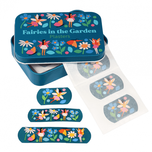An open tin with fairys plasters coming out of it. On The front of the tin there are pictures of faries and flowers and infront of it there are 3 different sized fairy plasters