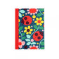 Small notebook with ladybirds and yellow and pink flowers on the front.