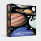 Black box with images of planet jigsaw puzzles on the front. The box reads: Planet jigsaw puzzle, 8 separate planets 1 incredible puzzle 