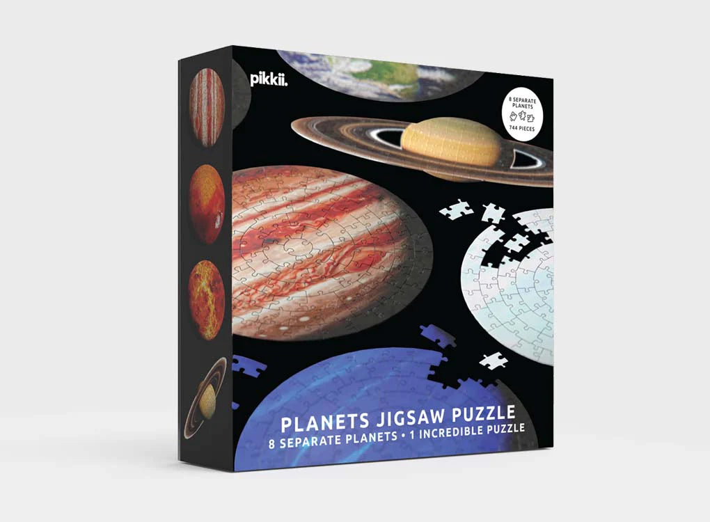 Black box with images of planet jigsaw puzzles on the front. The box reads: Planet jigsaw puzzle, 8 separate planets 1 incredible puzzle 