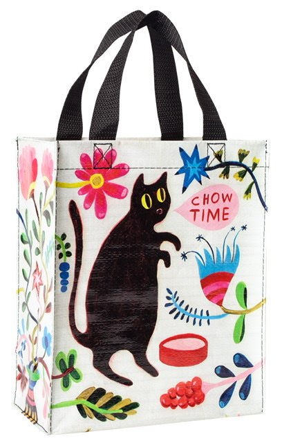 A white Blue Q lunch bag with a drawing of a black cat with pink blue yellow and green around. The text reads: Chow time