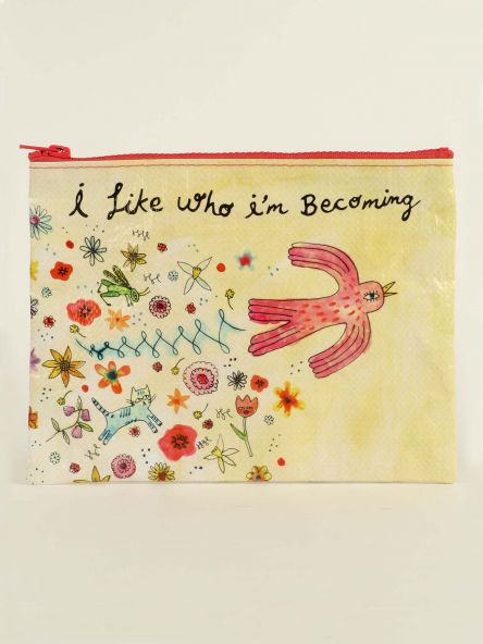 Yellow, Blue Q zipper pouch with a drawing of a red bird with colourful flowers. The text reads: I like who i'm becoming