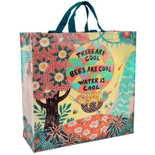 A Blue Q tote bag with 3 characters in a hot air balloon. The text reads: Trees are cool - Bees are cool - Water is cool