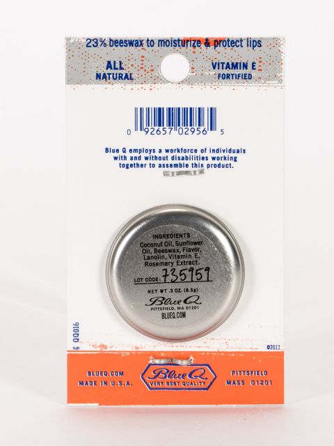 The back of the packaging for Blue Q lip shit Orange and mango, showing the ingredients of the product