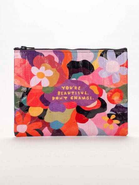 A Blue Q zipper pouch with multicoloured flowers and squiggles all over. The text reads: You're beautiful don't change