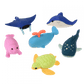 6 different erasers shaped like a pink seal, blue stingray, dolphin, whale, shark and a green and yellow turtle.