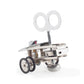 Image shows small wind-up metal toy that sparks as it walks 